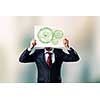 Businessman hiding face behind paper sheet. Working business mechanism