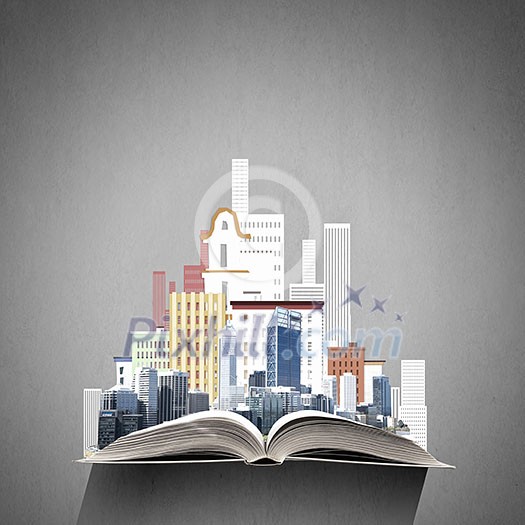 Opened book with modern city model on pages Opened book with modern city model on pages