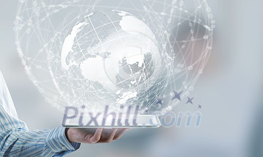 Businessman holding in hand tablet with global connection concept Businessman holding in hand tablet with global connection concept