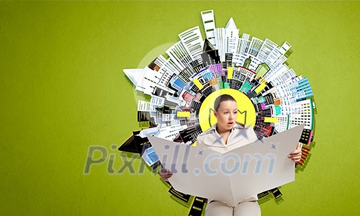 Portrait of young businesswoman in white suit reading blank newspaper Portrait of young businesswoman in white suit reading blank newspaper