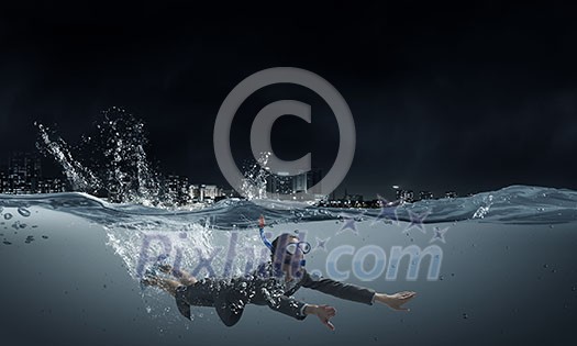 Young businesswoman in suit and diving mask swimming under water Young businesswoman in suit and diving mask swimming under water