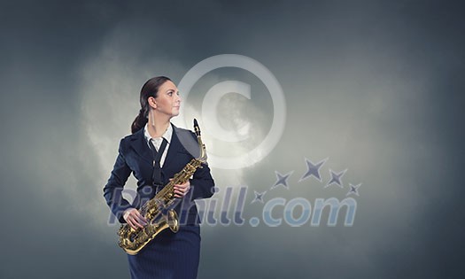 Young woman in suit with saxophone in hands Young woman in suit with saxophone in hands