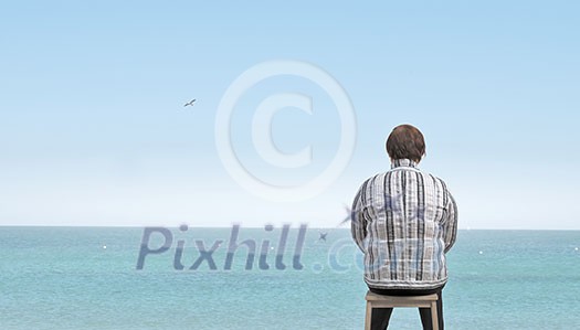 Middle aged stout woman sitting with back Middle aged stout woman sitting with back