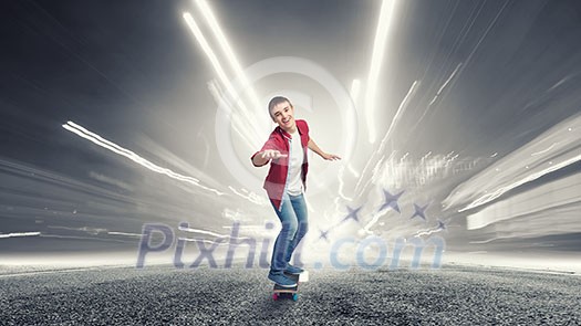 Handsome teenager cool acive boy riding skateboard Handsome teenager cool acive boy riding skateboard