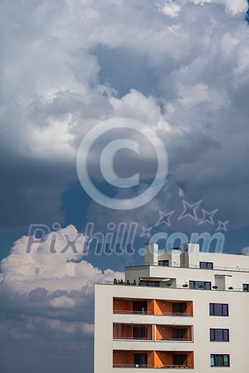 Residential housing in a city - housing project with plenty of sky as ample copy space Residential housing in a city - housing project with plenty of sky as ample copy space