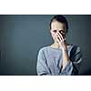 Young woman suffering from severe depression/anxiety/sadness, crying, tears coming from her eyes
