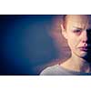 Young woman suffering from severe depression/anxiety/sadness, crying, tears coming from her eyes