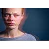 Young woman suffering from severe depression/anxiety/sadness, crying, tears coming from her eyes