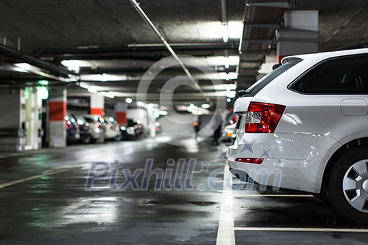 Underground parking/garage (shallow DOF; color toned image) Underground parking/garage (shallow DOF; color toned image)