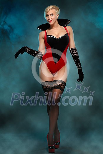 Elegant woman in sexy clothes. Clouds of smoke. Elegant woman in sexy clothes. Clouds of smoke.
