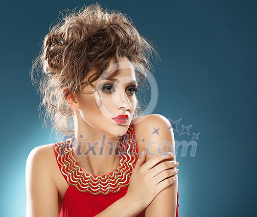 Beauty Portrait. Beautiful girl in red dress and fashionable hairstyle. Perfect Fresh Skin. Pure Beauty Model Beauty Portrait. Beautiful girl in red dress and fashionable hairstyle. Perfect Fresh Skin. Pure Beauty Model