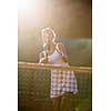 Portrait of a pretty young tennis player