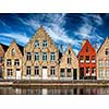 Old houses and canal in Bruges (Brugge) on sunset, Belgium