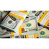 Creative business finance making money concept - panoramic background of new 100 US dollars 2013 edition banknotes (bills) bundles close up