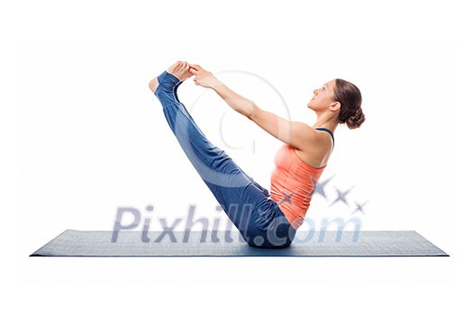 Beautiful sporty fit woman practices yoga asana Ubhaya padangusthasana - both big double toe pose isolated on white Beautiful sporty fit woman practices yoga asana Ubhaya padangusthasana - both big double toe pose isolated on white