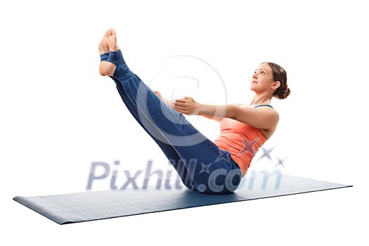 Beautiful sporty fit yogini woman practices yoga asana Paripurna navasana - boat pose isolated on white background Beautiful sporty fit yogini woman practices yoga asana Paripurna navasana - boat pose isolated on white background