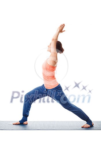 Beautiful sporty fit yogini woman practices yoga asana Virabhadrasana 1 - warrior pose 1 isolated on white Beautiful sporty fit yogini woman practices yoga asana Virabhadrasana 1 - warrior pose 1 isolated on white