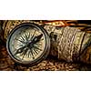 Travel geography navigation concept background - panorama of old vintage retro compass on ancient world map