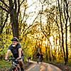 Senior man on his mountain bike outdoors (shallow DOF; color toned image)