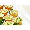 Plate of many mini bite size quiche appetizers