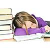 Teenage girl studying at the desk being tired