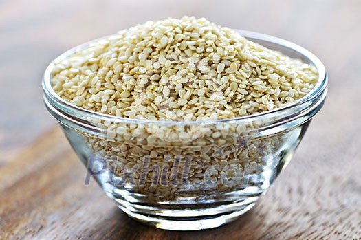 Sesame seeds close up in glass bowl Sesame seeds close up in glass bowl