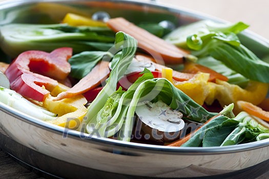 Vegetable stir fry of bok choy mushroom peppers carrots Vegetable stir fry of bok choy mushroom peppers carrots
