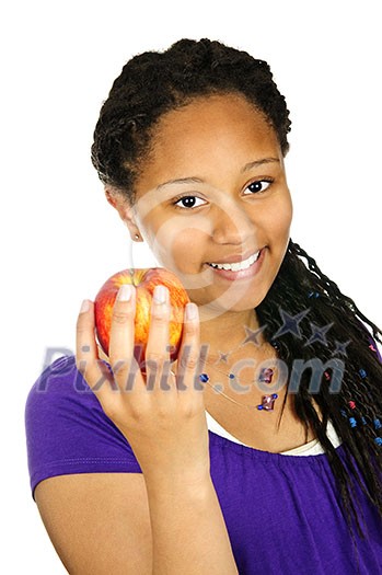 Isolated portrait of black teenage girl holding apple Isolated portrait of black teenage girl holding apple