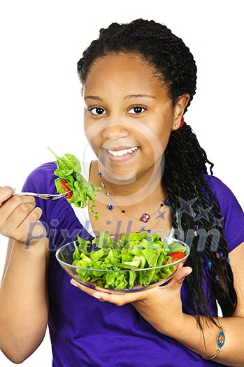 Isolated portrait of black teenage girl with salad bowl Isolated portrait of black teenage girl with salad bowl