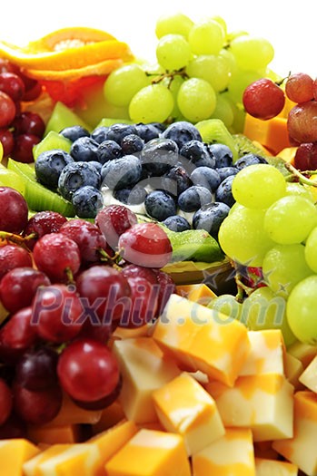 Platter of assorted fresh fruit and cheese Platter of assorted fresh fruit and cheese