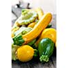 Assorted whole fresh organic mini zucchinis vegetables