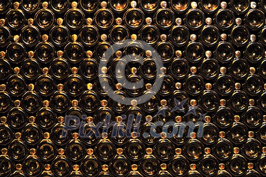 Large stack of wine bottle bottoms in winery Large stack of wine bottle bottoms in winery