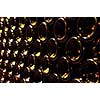 Large stack of wine bottle bottoms in winery