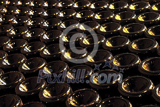 Large stack of wine bottle bottoms in winery Large stack of wine bottle bottoms in winery