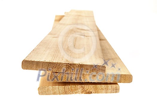 Three cedar one by six inch wood planks on white background Three cedar one by six inch wood planks on white background