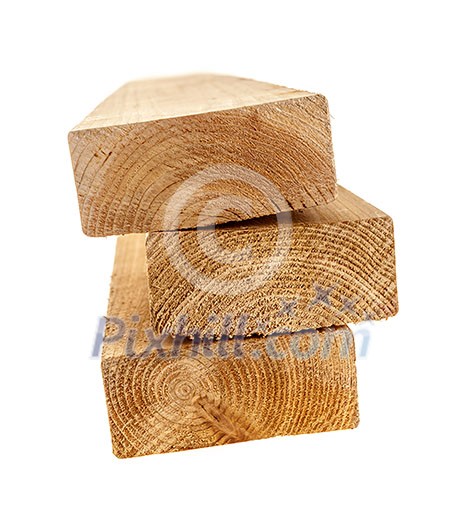 Edge of three cedar two by four wood boards on white background Edge of three cedar two by four wood boards on white background