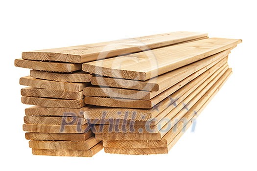 Stacks of cedar one by six inch wood planks on white background Stacks of cedar one by six inch wood planks on white background