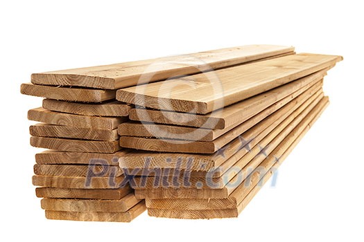 Stacks of one by six inch cedar boards on white background Stacks of one by six inch cedar boards on white background