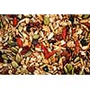 Closeup of homemade granola with various seeds and berries