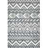 Knit fabric background with knitted grey and white geometric pattern