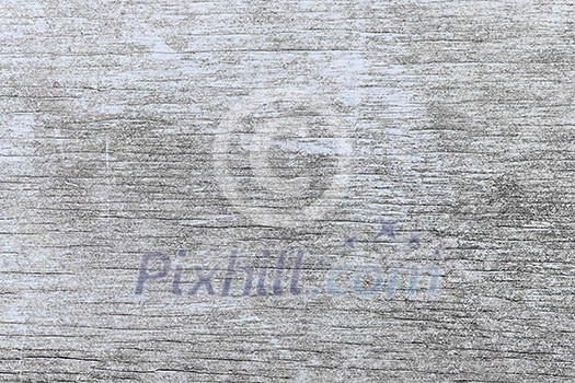 Old wooden background of weathered distressed rustic wood with faded light blue paint showing woodgrain texture Old wooden background of weathered distressed rustic wood with faded light blue paint showing woodgrain texture