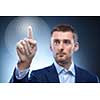 business man pressing touchscreen button