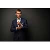 handsome businessman on black