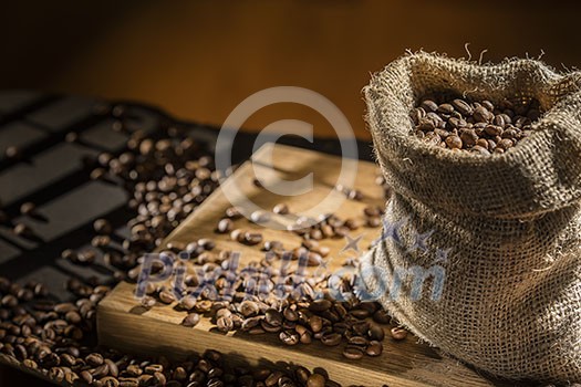 coffee beans in bag on wood coffee beans in bag on wood