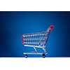 shopping cart on blue background