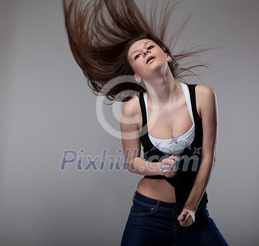 attractive young woman dancing attractive young woman dancing