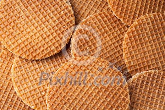 Waffles with caramel background. Top view Waffles with caramel background. Top view