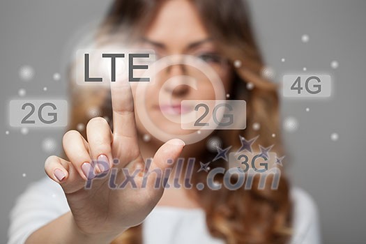 woman pressing LTE touchscreen button woman pressing LTE touchscreen button