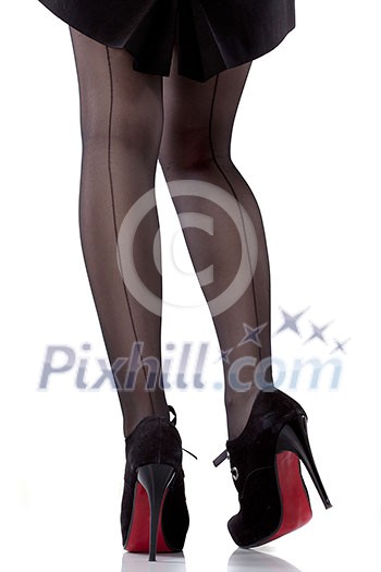sexy woman legs and shoes isolated on white sexy woman legs and shoes isolated on white