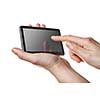 small tablet pc with touch screen in hands isolated on white